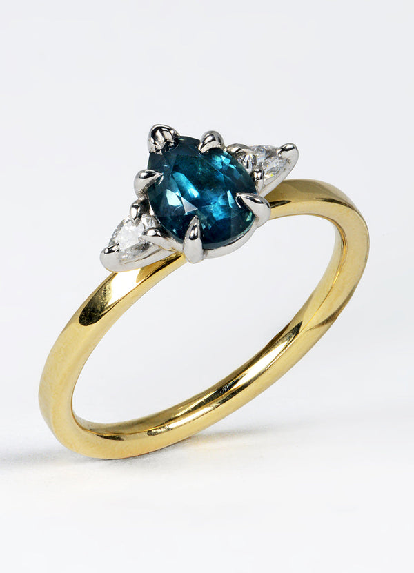 1.02ct Pear Shaped Teal Sapphire Trilogy Ring James Newman Jewellery