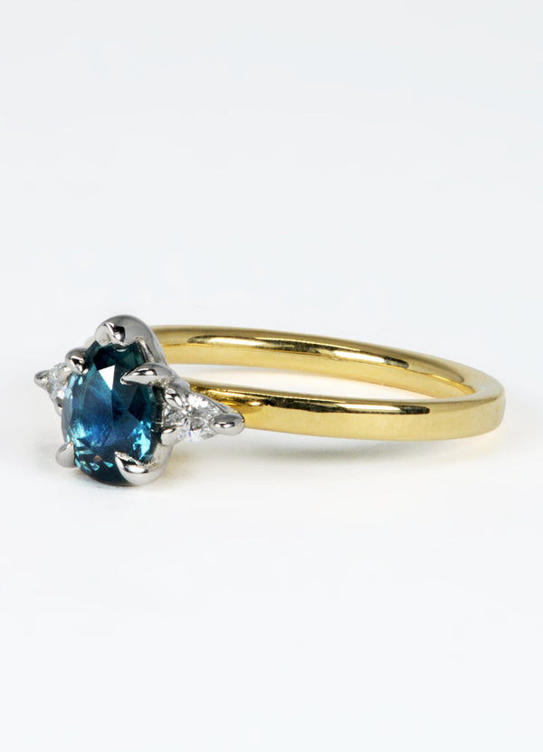1.02ct Pear Shaped Teal Sapphire Trilogy Ring James Newman Jewellery