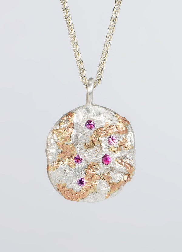 Pink Sapphire Encrusted Round Silver Flux Pendant with Red Gold Detail James Newman Jewellery