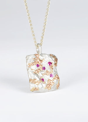 Pink Sapphire Encrusted Square Silver Flux Pendant with Red Gold Detail James Newman Jewellery