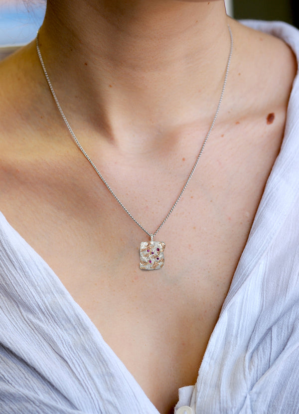 Pink Sapphire Encrusted Square Silver Flux Pendant with Red Gold Detail James Newman Jewellery