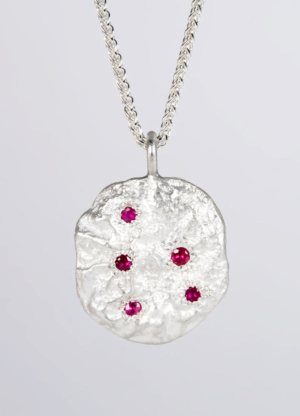 Ruby Encrusted Round Silver Flux Pendant James Newman Jewellery