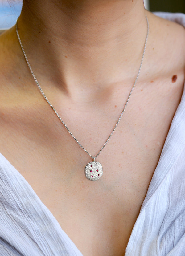 Ruby Encrusted Round Silver Flux Pendant James Newman Jewellery